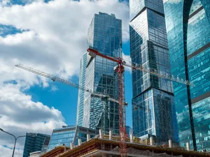 Modern skyscrapers under construction with cranes. jigsaw puzzle