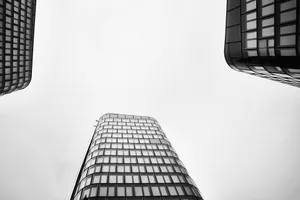 a black and white photo of a tall building jigsaw puzzle