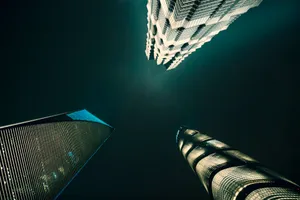 three low-angle photography of buildings jigsaw puzzle