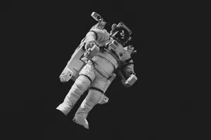 astronaut in white suit in grayscale photography jigsaw puzzle