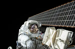 photography of Astronaut beside satellite jigsaw puzzle