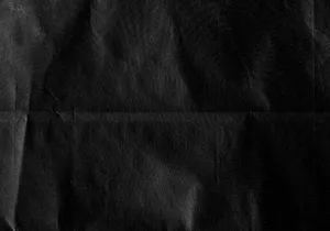 a piece of black paper with a black background jigsaw puzzle