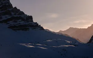 Tranquil winter scene of snow-covered mountains at sunrise in Kibber, India. jigsaw puzzle