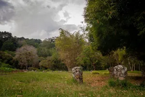 View of a stone gate and lush greenery in Mérida, Mérida, Venezuela. jigsaw puzzle
