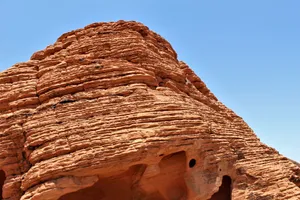 Stunning red rock formations against a clear blue sky, showcasing natural texture patterns. jigsaw puzzle