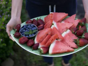 Delicious platter of fresh watermelon, strawberries, and blueberries, perfect for a healthy snack. jigsaw puzzle