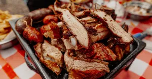 Delicious grilled meats on a platter at an Argentinian asado. Perfectly roasted in Buenos Aires. jigsaw puzzle