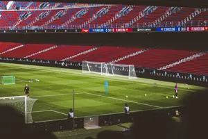 View of empty soccer field at FC Barcelona's Camp Nou with training equipment. jigsaw puzzle