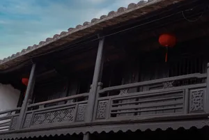 Elegant Asian architectural style with ornate balcony and red lanterns. jigsaw puzzle