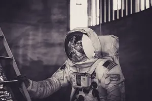 Astronaut in spacesuit climbing ladder inside a dark setting. jigsaw puzzle