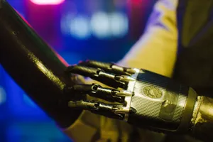 Close-up of a sleek prosthetic hand interacting with a robotic arm in a high-tech environment. jigsaw puzzle