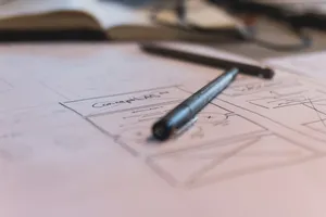 A sketch with notes and a pen on paper. Ideal for planning or design concepts. jigsaw puzzle