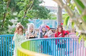 Vibrant cosplay group enjoying a sunny day at an amusement park. jigsaw puzzle