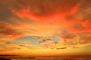 silhouette photo of body of water under orange clouds jigsaw puzzle