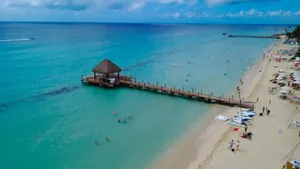 Tropical beach with pier and clear turquoise water. jigsaw puzzle