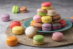 a plate that has a bunch of different colored macaroons on it jigsaw puzzle