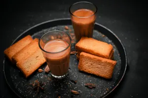 a plate of food that includes bread and a drink jigsaw puzzle