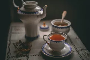 white ceramic teapot beside white ceramic teacup on saucer jigsaw puzzle
