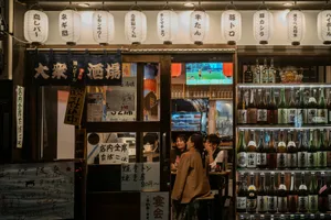 Traditional japanese bar with glowing lanterns and people inside. jigsaw puzzle