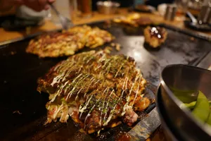 Okonomiyaki cooking on a hot plate jigsaw puzzle