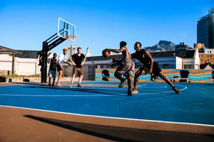 a group of young men playing a game of basketball jigsaw puzzle