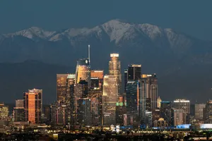 a view of a city with mountains in the background jigsaw puzzle