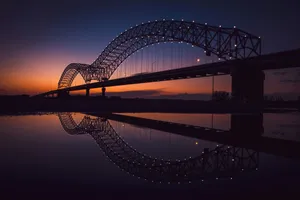 bridge over body of water during night time jigsaw puzzle