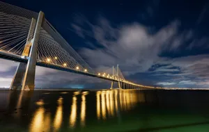 A long exposure photo of a bridge at night jigsaw puzzle