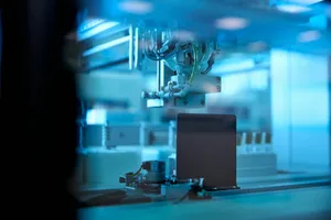 industrial robotic arm in blue lit factory jigsaw puzzle