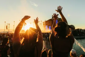 a group of people raising their hands in the air jigsaw puzzle