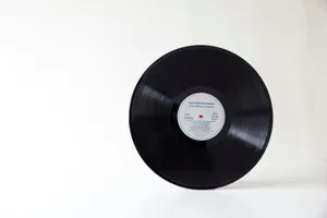 a black circular object with a white label on it jigsaw puzzle