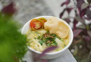 a bowl of food on a wooden table jigsaw puzzle