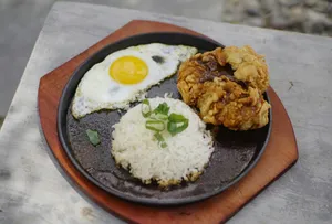 a plate of food with rice, fried eggs, and meat jigsaw puzzle