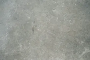 a close up view of a gray marble floor jigsaw puzzle