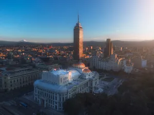 Skyline featuring Torre Latinoamericana in Mexico City during sunset, showcasing urban architecture. jigsaw puzzle